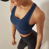 Woman Wearing Seamless High Impact Sports Bra Blue